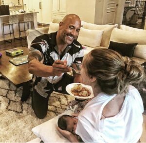 Father Feeds Mother as She Breastfeeds Baby2.dailyfamily.ng